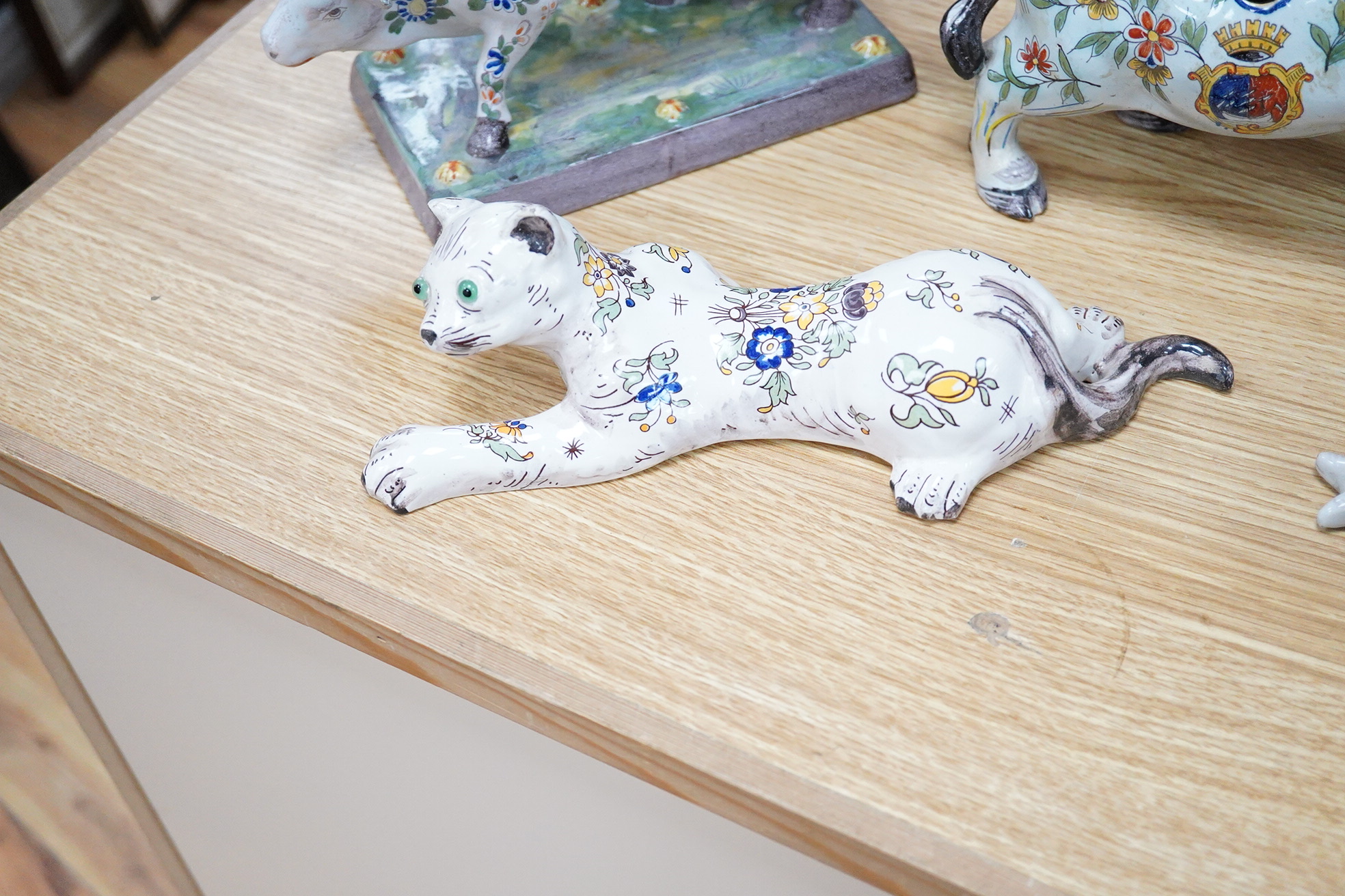 19th century French faience models of cows, a cat and a frog .(9), Tallest 30 cm